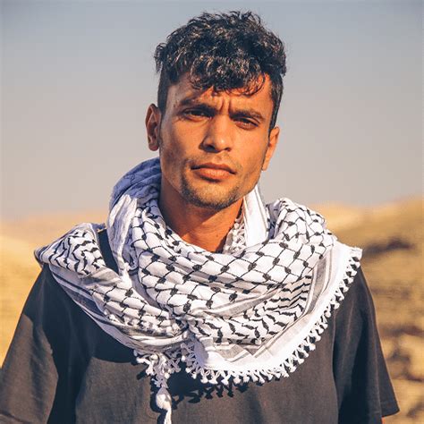 why do arabs wear keffiyeh.